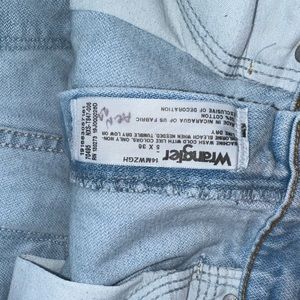 White wash Wrangler cowboy cut jeans